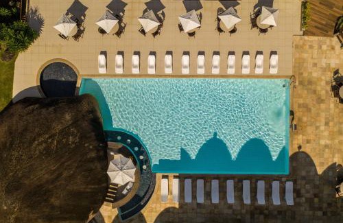 Portogalo Hotel | Discover Portogalo Suite Hotel with Private Beach & Pool