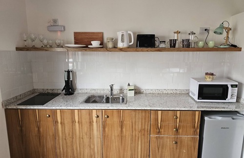 San Antonio de Areco Apartment | Relax at Posada del Atelier with Spa and Family Amenities