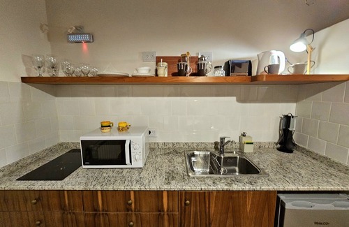 San Antonio de Areco Apartment | Relax at Posada del Atelier with Spa and Family Amenities
