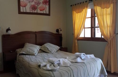 Capilla del Monte Hotel | Inviting Posada del Infinito: Oceanfront Bliss Awaits
