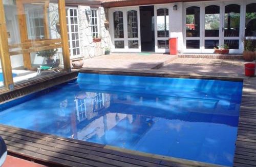 La Falda Hotel | Discover Posada La Campiña: Family-Friendly with Pool & Hot Tub