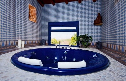 Gibralgalia House | Enjoy Poolside Relaxation at Posada los Cántaros
