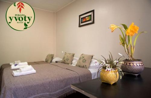 Zona Granja Hotel | Cozy Stay at Posada Yvoty with Pool and Breakfast Included