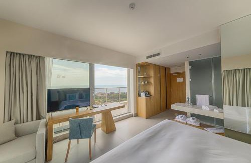 Golden Sands Hotel | Indulge in Poseidon Beach Resort's Private Beach Escape