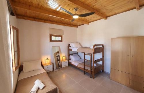 Neo Kalamaki House | Relax at Poseidon House: Beachside with Scenic Sea Views