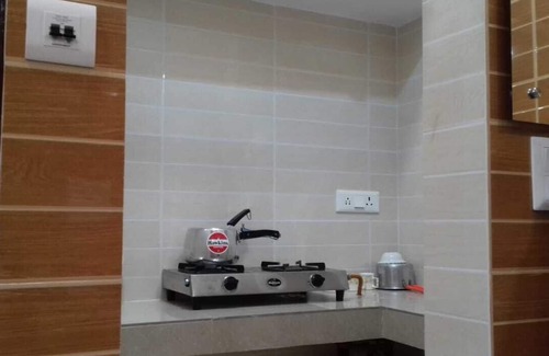 Lajpat Nagar Apartment | Prime South Delhi Stay: Safe Area with Kitchen Access