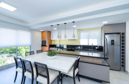 Quatro Ilhas Apartment | Unwind at Positano 206: Guest Rated 9.8, Steps from Beach