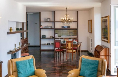Fiumelatte Apartment | Discover POSTCARD 1 by Design Studio: Family-Friendly Retreat
