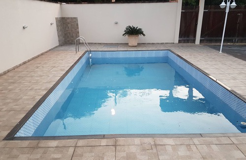 Caneca Fina Cottage | Discover Pousada Aguibam: Poolside Relaxation Awaits
