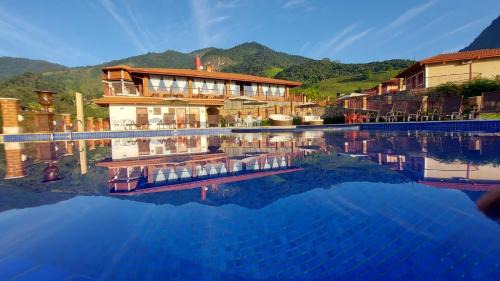 Sao Bento do Sapucai Hotel | Experience Oceanfront Living at Pousada Aldeia Manacás