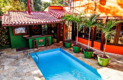 Manguinhos Hotel | Relax at Pousada Alforria: Pool, Restaurant & Family Fun