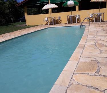 Monteiro Lobato Hotel | Pousada Alto do Morro: Oceanfront Retreat with Pool
