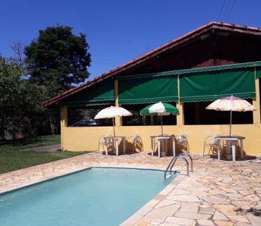 Monteiro Lobato Hotel | Pousada Alto do Morro: Oceanfront Retreat with Pool