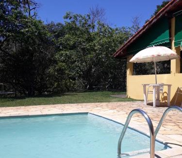 Monteiro Lobato Hotel | Pousada Alto do Morro: Oceanfront Retreat with Pool