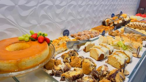 Praia da Armacao do Itapocoroi Bed & Breakfast | Guest Rated: Pousada Amanhecer do Sul with Family-Friendly Amenities