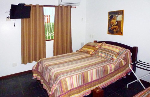 Ilha Grande Hotel | Oceanfront Bliss at Pousada Ancoradouro - Rated 9/10!