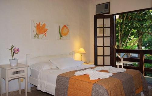 Sao Sebastiao Hotel | Cozy Pousada Armação de Camburi: Oceanfront Retreat Awaits