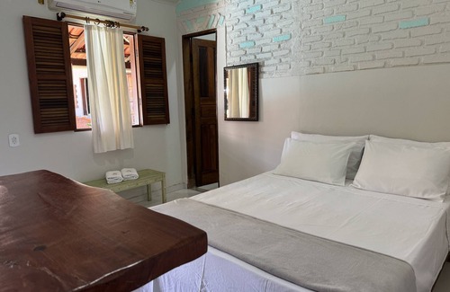 Itaunas Hotel | Inviting Pousada Askalon: Pool, Breakfast & Family-Friendly
