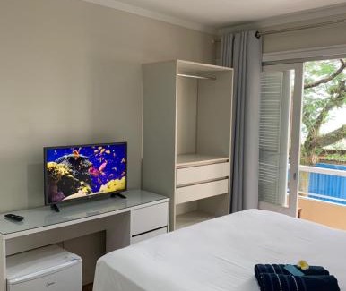 Pioneiros Hotel | Charming Pousada Balneário Camboriú with Hot Tub & Family Fun