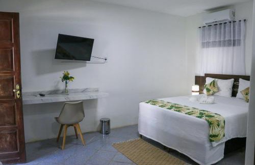 Arraial d'Ajuda Hotel | Pousada Bella Vida: 5-Star Retreat with Pool & Family Amenities