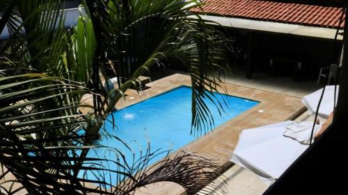 Rio das Ostras Hotel | Pet-Friendly Escape at Pousada Belmare with Poolside Relaxation