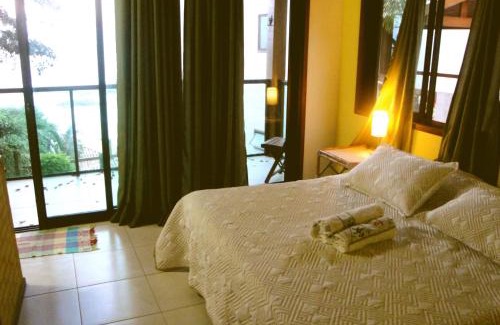 Setiba Hotel | Inviting Pousada Bem Te Vi with Pool and Oceanfront Views