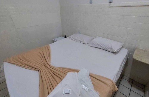 Baixo Sao Francisco Hotel | Budget-Friendly Stay at Pousada Bomfim with Family Amenities
