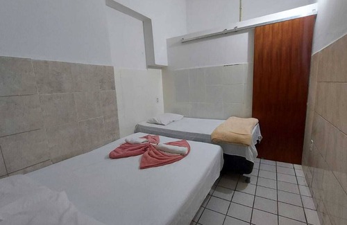 Baixo Sao Francisco Hotel | Budget-Friendly Stay at Pousada Bomfim with Family Amenities