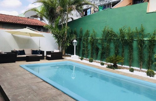 Parque Oasis Condo | Pousada Triple Suite: Poolside Relaxation Steps from the Sea