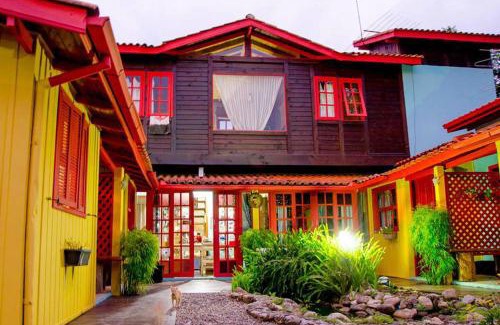 Praia do Rosa Hotel | Discover Pousada Cacau: Oceanfront Retreat with Pool
