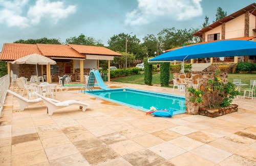 Triunfo Hotel | Discover Pousada Calugi: Pet-Friendly Stay with Pool
