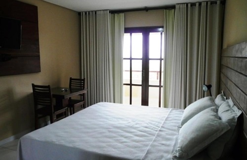 Triunfo Hotel | Discover Pousada Calugi: Pet-Friendly Stay with Pool