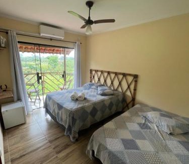 Guapimirim House | Discover Pousada Camping dos Ypês: Pet & Child Friendly Retreat