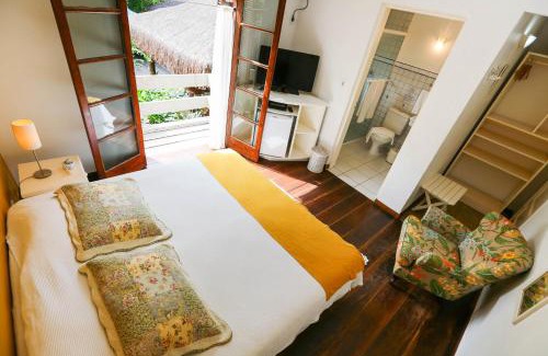 Sao Sebastiao Hotel | Discover Pousada Canto do Camburi with Ocean Views & Pool