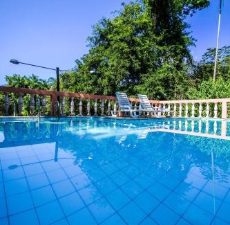 Paraty Hotel | Welcoming Pousada Canto do Curió with Pool & Family Focus