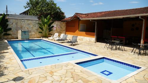 Ipiranga Hotel | Pet Friendly Pousada Caraguá with Pool and Family Amenities
