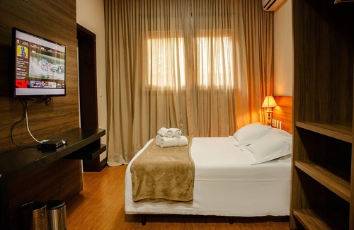Chapada dos Guimaraes Hotel | Discover Pousada Casa Da Quineira: Family-Friendly Retreat