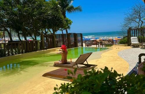 Tombo Hotel | Relax at Casa Canoa Hotel Boutique with Oceanfront Pool