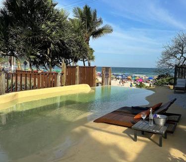 Tombo Hotel | Relax at Casa Canoa Hotel Boutique with Oceanfront Pool