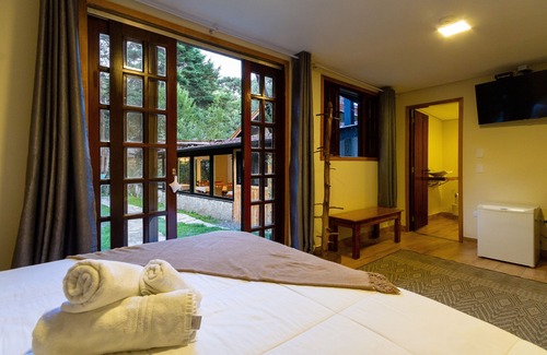 Loteamento Jardim Veu da Noiva Hotel | Inviting Pousada Casa Mantiqueira: Spa & Family-Friendly Stay