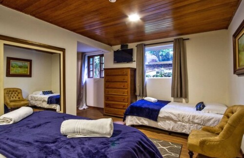 Loteamento Jardim Veu da Noiva Hotel | Inviting Pousada Casa Mantiqueira: Spa & Family-Friendly Stay