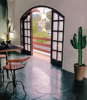 Quitandinha Hotel | Discover Pousada Casa Recanto da Serra with Ocean View Pool