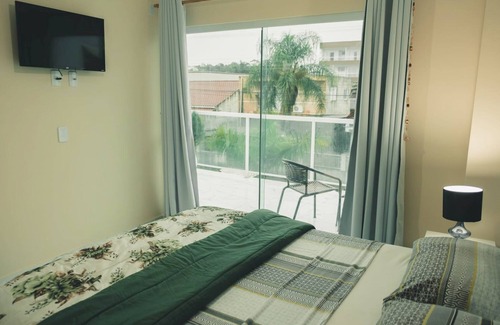 Praia da Armacao do Itapocoroi Hotel | Elegant Pousada Cavalero: Spa, Breakfast & Family-Friendly