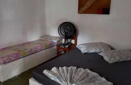 Peruibe Hotel | Relax at Pousada Cavalo de Pedra with Ocean View & Pool
