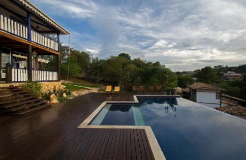 Cachoeira do Campo Hotel | Inviting Pousada Chão de Minas with Pool & Breakfast