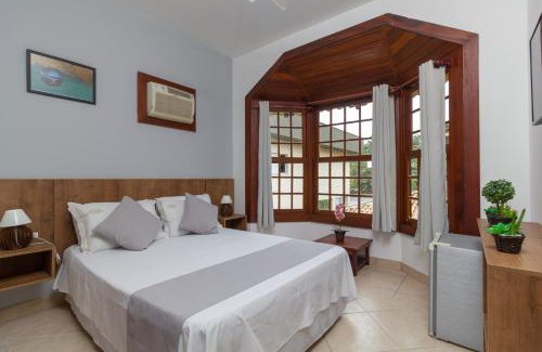 Portal das Artes Hotel | Discover Pousada Cicerone: Family-Friendly with Pool Access