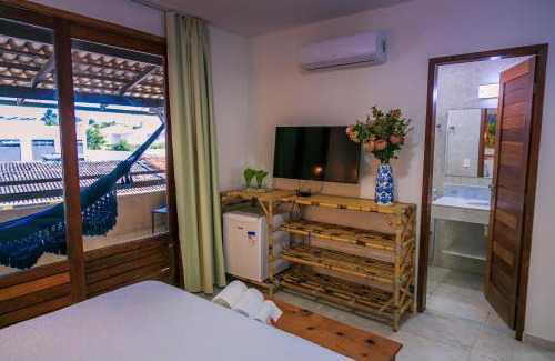 Alcacus Hotel | Discover Pousada Cocoa: Pet-Friendly Oasis with Ocean Views