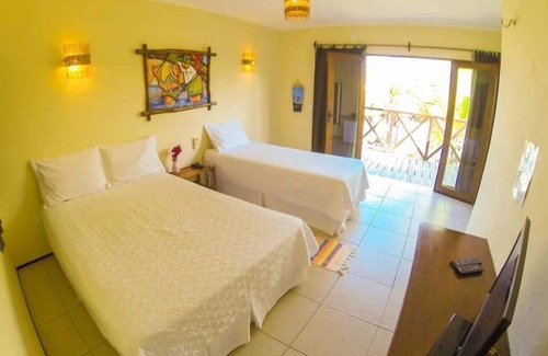 Coqueiro Hotel | Cozy Pousada Coqueiro Beach: Family-Friendly with Dining