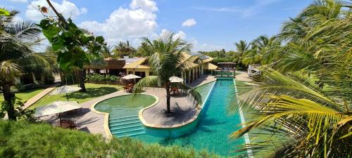 Coqueiro Hotel | Cozy Pousada Coqueiro Beach: Oceanfront Retreat with Pool