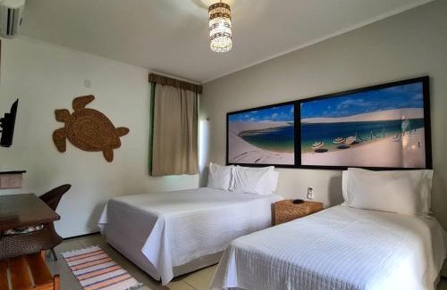 Coqueiro Hotel | Cozy Pousada Coqueiro Beach: Oceanfront Retreat with Pool